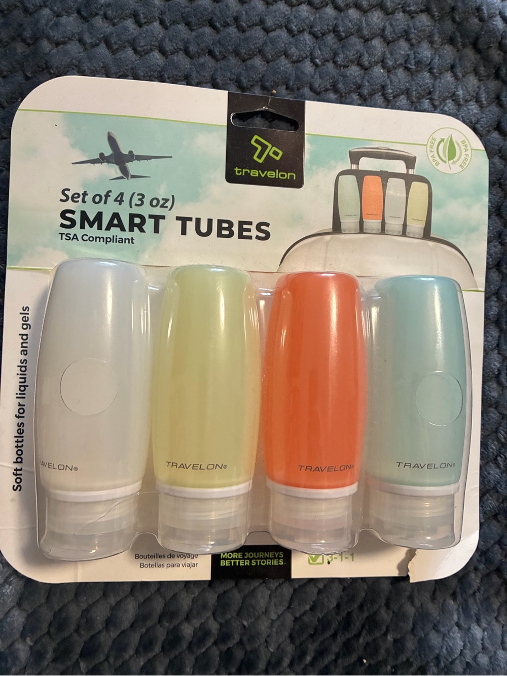Travelon Smart Tubes 4-Pack in White, Pale Yellow, Orange, Light Blue